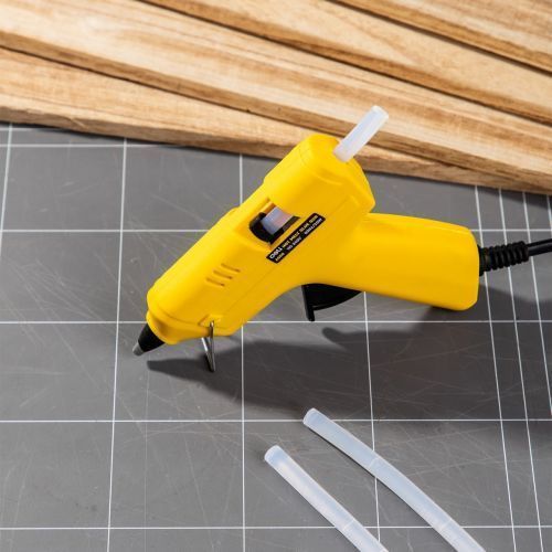 Пiстолет для клею Deli ЕА50061 жовт 7мм 20W+ 3стрижня 258155 фото